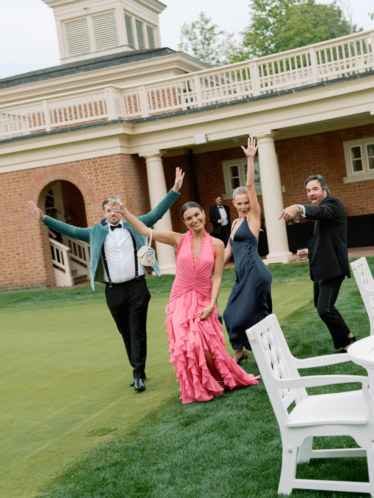 Outdoor ceremony aisle lined with lush pastel florals at New Albany Country Club.